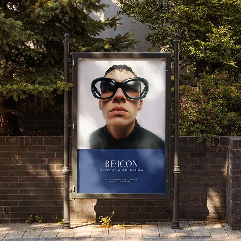 Advertisement BE•ICON with male model posing looking at the camera