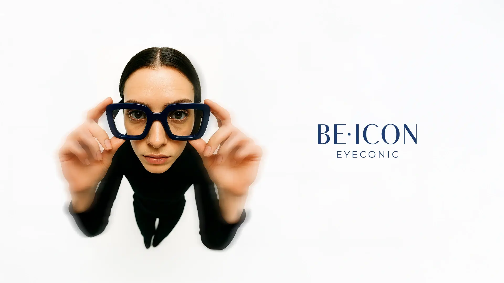 Hero image, girl wearing bold glasses lookin at the camera with BE•ICON logo
